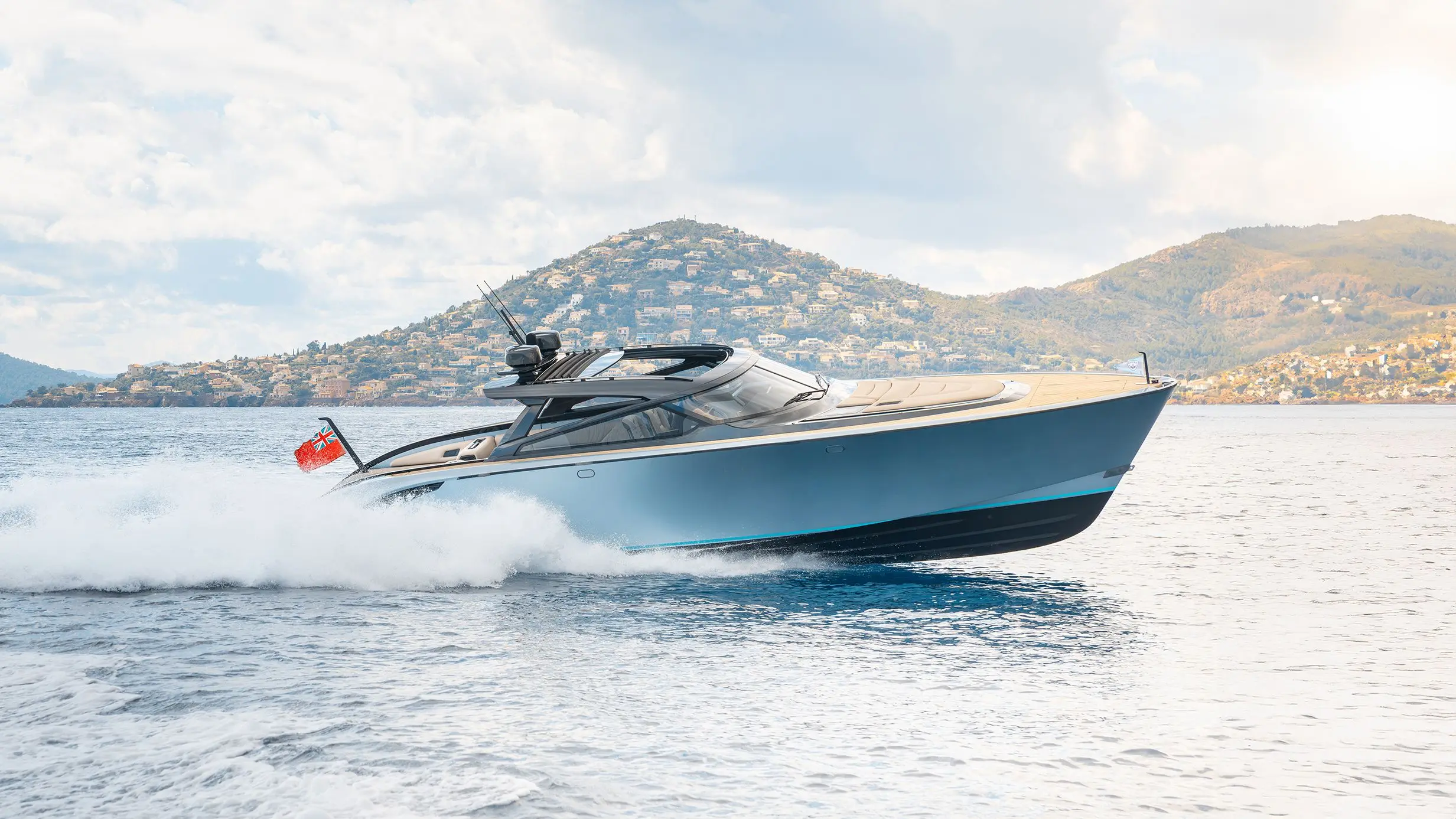 Wajer 44 HT underway in a bay in France, exterior hero shot showing the hardtop profile