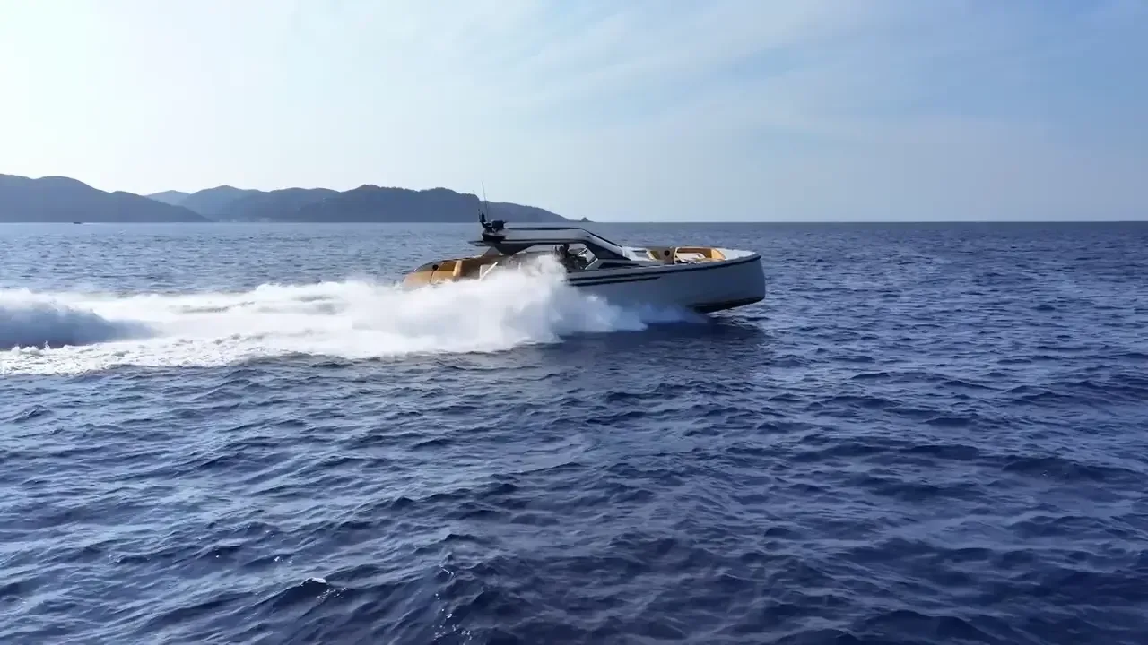 Vanquish VQ55 video poster still, full profile on water