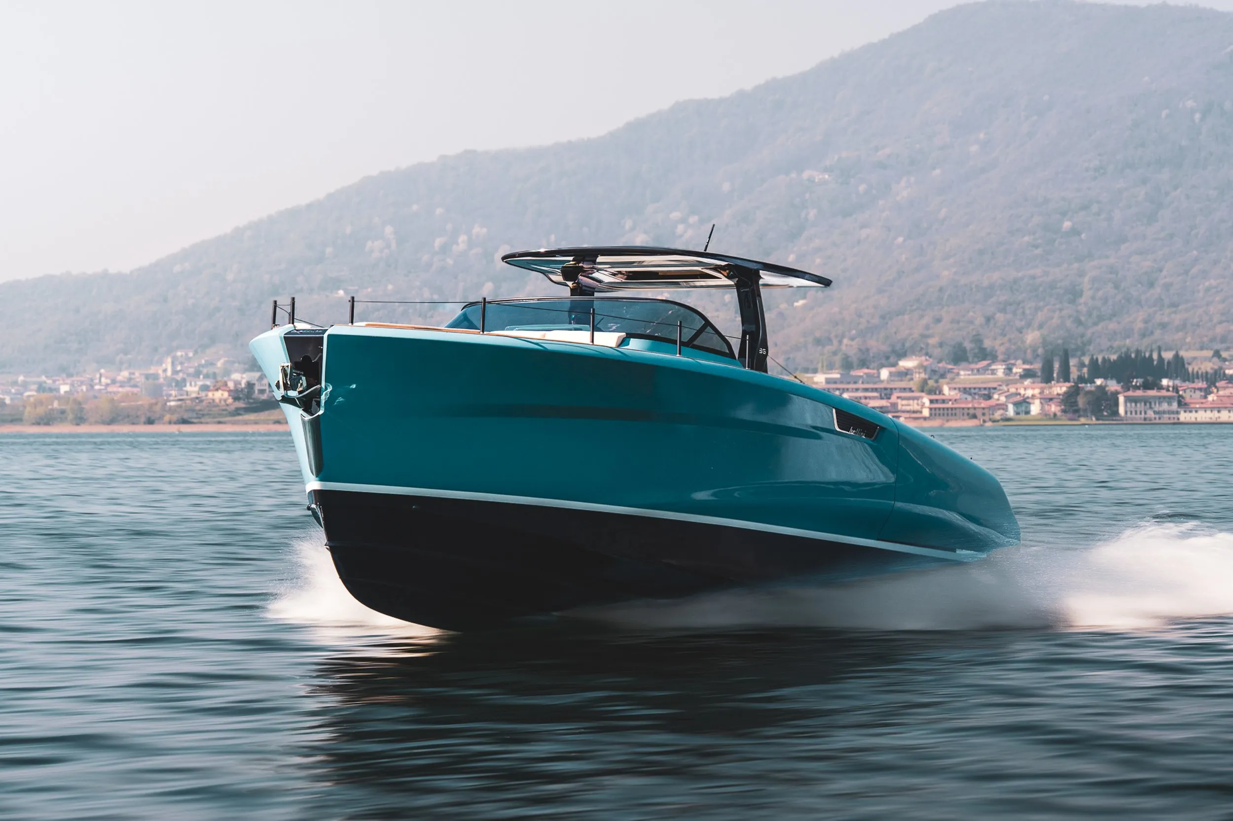 Bellini Astor 36 underway on open water showing planing attitude and hull entry