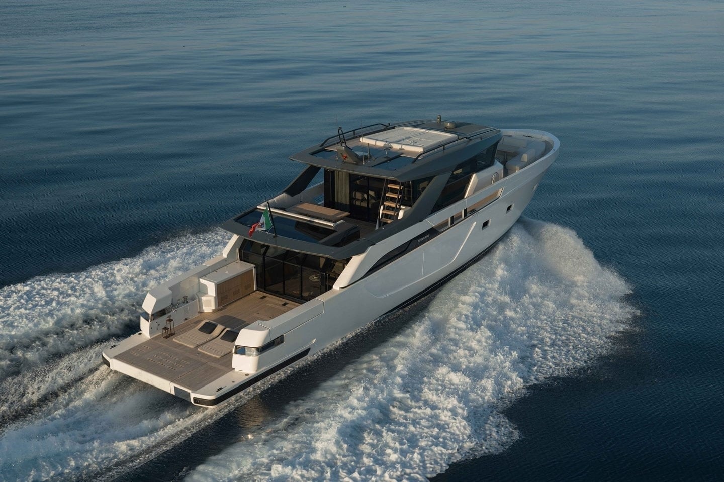 Bluegame BGX73 exterior view, full hull profile at sea