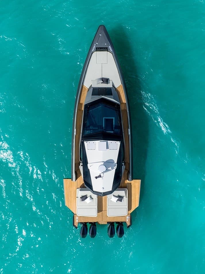 Wally wallypower50X running at speed on open water, showing the outboard-optimised transom notch and wallypower family lines